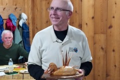 Dr. Jim Tomko wins raffle.  John Lillich\'s hand-carved Northern Shoveler.